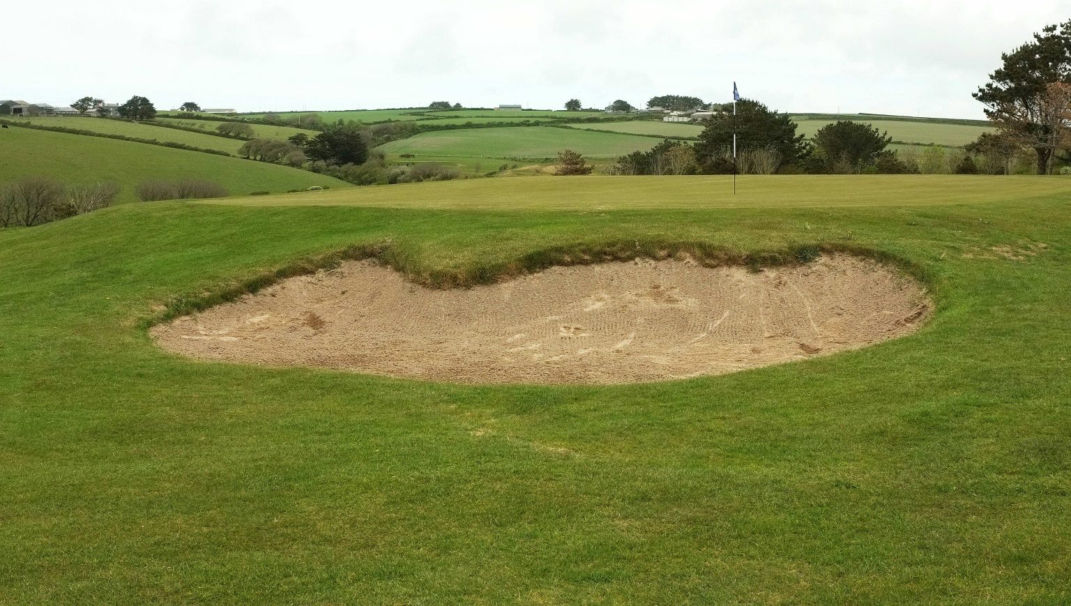 The Point at Polzeath Golf Course Review — 18 Holes Above the Camel Estuary Bunker on Roserrow Golf Course, now The Point at Polzeath, near St Minver in Cornwall